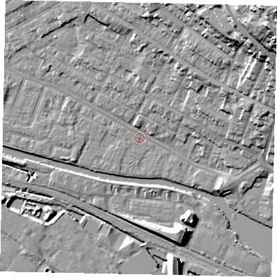 Shaded relief map of the ground around LN11ST, computed from Environment Agency LiDAR. The ground here sits at about 5 m above sea level and falls 48 m across the surrounding 800 m. Surface water reaching this point runs off ground lying to the north-north-east, 24.5 m higher.