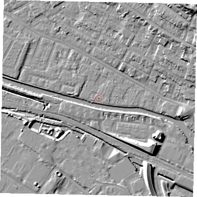 Shaded relief map of the ground around LN11SX, computed from Environment Agency LiDAR. The ground here sits at about 6 m above sea level and falls 26 m across the surrounding 800 m. Surface water reaching this point runs off ground lying to the west, 2.5 m higher.