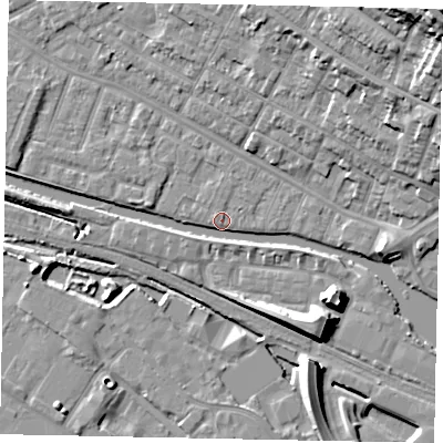 Shaded relief map of the ground around LN11SZ, computed from Environment Agency LiDAR. The ground here sits at about 6 m above sea level and falls 28 m across the surrounding 800 m. Surface water reaching this point runs off ground lying to the west, 2.5 m higher.