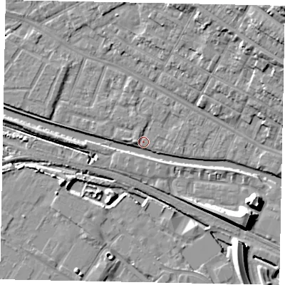 Shaded relief map of the ground around LN11TW, computed from Environment Agency LiDAR. The ground here sits at about 5 m above sea level and falls 20 m across the surrounding 800 m. Surface water reaching this point runs off ground lying to the west, 2.5 m higher.