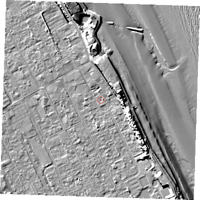 Shaded relief map of the ground around LN122AA, computed from Environment Agency LiDAR. The ground here sits at about 2 m above sea level and falls 14 m across the surrounding 800 m. Surface water reaching this point runs off ground lying to the east-north-east, 10.5 m higher.