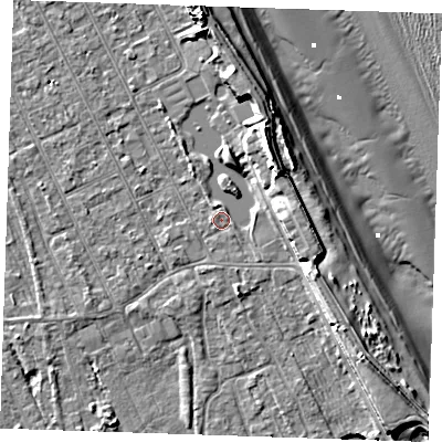 Shaded relief map of the ground around LN122AN, computed from Environment Agency LiDAR. The ground here sits at about 2 m above sea level and falls 12 m across the surrounding 800 m. Surface water reaching this point runs off ground lying to the east, 3.6 m higher.
