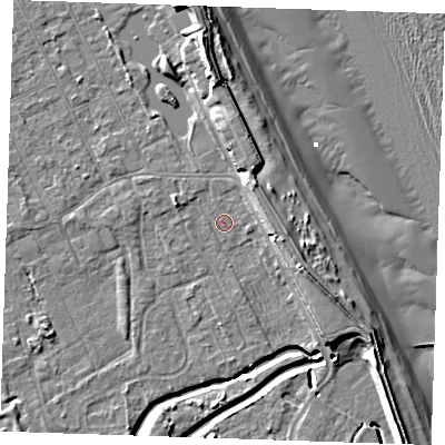 Shaded relief map of the ground around LN122AP, computed from Environment Agency LiDAR. The ground here sits at about 2 m above sea level and falls 11 m across the surrounding 800 m. Surface water reaching this point runs off ground lying to the north-east, 4.8 m higher.
