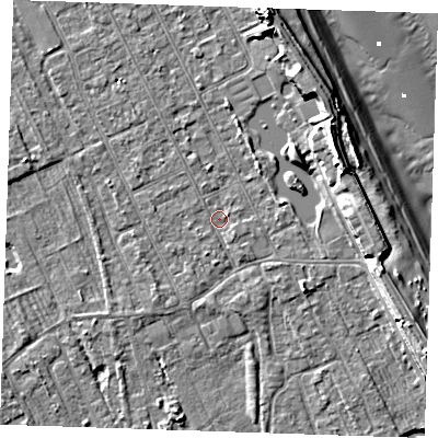 Shaded relief map of the ground around LN122BS, computed from Environment Agency LiDAR. The ground here sits at about 2 m above sea level and falls 11 m across the surrounding 800 m. Surface water reaching this point runs off ground lying to the south, 0.9 m higher.