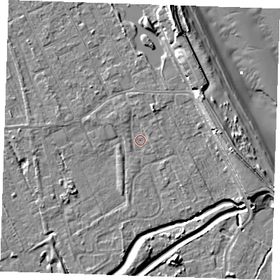 Shaded relief map of the ground around LN122BX, computed from Environment Agency LiDAR. The ground here sits at about 2 m above sea level and falls 10 m across the surrounding 800 m. Surface water reaching this point runs off ground lying to the north-east, 4.9 m higher.