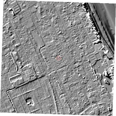 Shaded relief map of the ground around LN122DL, computed from Environment Agency LiDAR. The ground here sits at about 2 m above sea level and falls 13 m across the surrounding 800 m. Surface water reaching this point runs off ground lying to the south-east, 1.5 m higher.