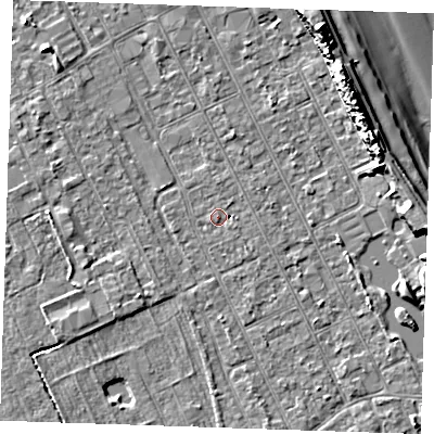 Shaded relief map of the ground around LN122DW, computed from Environment Agency LiDAR. The ground here sits at about 2 m above sea level and falls 13 m across the surrounding 800 m. Surface water reaching this point runs off ground lying to the south-east, 1.5 m higher.
