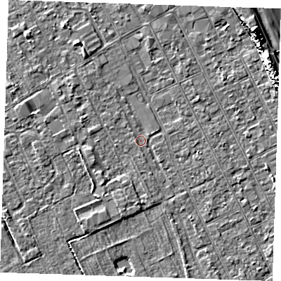 Shaded relief map of the ground around LN122EL, computed from Environment Agency LiDAR. The ground here sits at about 2 m above sea level and falls 11 m across the surrounding 800 m. Surface water reaching this point runs off ground lying to the south, 2.2 m higher.