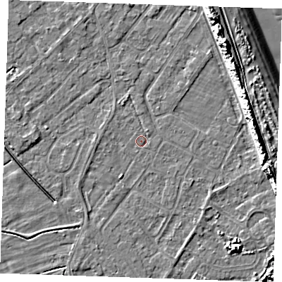 Shaded relief map of the ground around LN122TN, computed from Environment Agency LiDAR. The ground here sits at about 2 m above sea level and falls 12 m across the surrounding 800 m. Surface water reaching this point runs off ground lying to the south-south-west, 1.2 m higher.