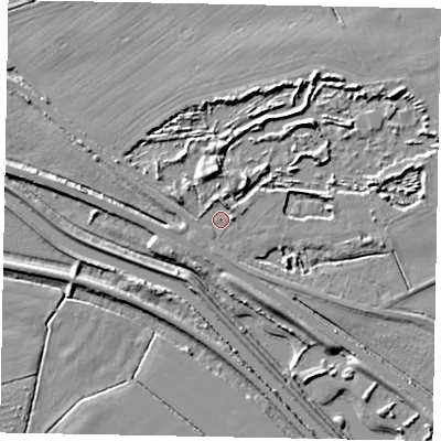 Shaded relief map of the ground around LN12BB, computed from Environment Agency LiDAR. The ground here sits at about 7 m above sea level and falls 8 m across the surrounding 800 m. Surface water reaching this point runs off ground lying to the north, 2.4 m higher.