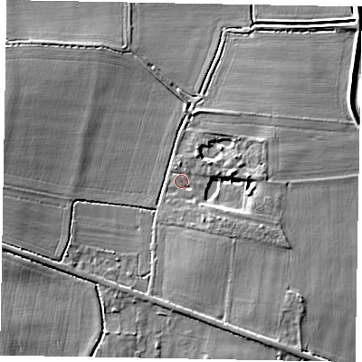 Shaded relief map of the ground around LN12BS, computed from Environment Agency LiDAR. The ground here sits at about 7 m above sea level and falls 7 m across the surrounding 800 m. Surface water reaching this point runs off ground lying to the east, 3.7 m higher.