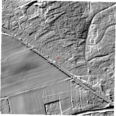 Shaded relief map of the ground around LN12NS, computed from Environment Agency LiDAR. The ground here sits at about 6 m above sea level and falls 11 m across the surrounding 800 m. Surface water reaching this point runs off ground lying to the north, 9.2 m higher.