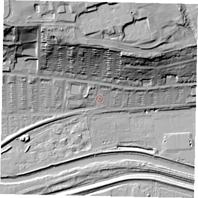Shaded relief map of the ground around LN25NQ, computed from Environment Agency LiDAR. The ground here sits at about 10 m above sea level and falls 46 m across the surrounding 800 m. Surface water reaching this point runs off ground lying to the north, 31.5 m higher.