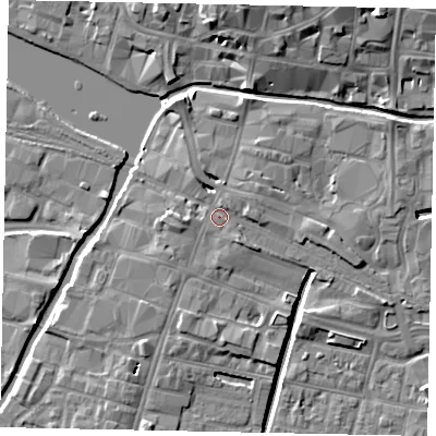 Shaded relief map of the ground around LN57DN, computed from Environment Agency LiDAR. The ground here sits at about 7 m above sea level and falls 11 m across the surrounding 800 m. Surface water reaching this point runs off ground lying to the south-east, 1.1 m higher.