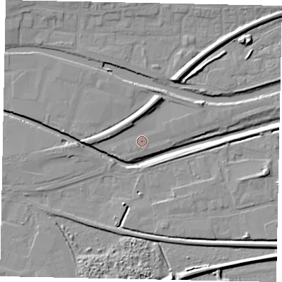 Shaded relief map of the ground around LN57JE, computed from Environment Agency LiDAR. The ground here sits at about 5 m above sea level and falls 8 m across the surrounding 800 m. Surface water reaching this point runs off ground lying to the north-north-west, 3.2 m higher.