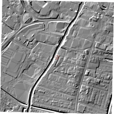Shaded relief map of the ground around LN57PB, computed from Environment Agency LiDAR. The ground here sits at about 7 m above sea level and falls 6 m across the surrounding 800 m. Surface water reaching this point runs off ground lying to the east, 3.7 m higher.