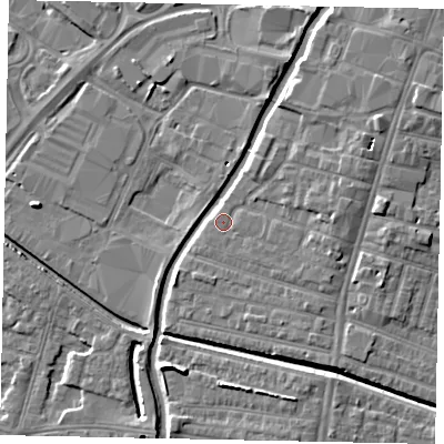 Shaded relief map of the ground around LN57RD, computed from Environment Agency LiDAR. The ground here sits at about 6 m above sea level and falls 7 m across the surrounding 800 m. Surface water reaching this point runs off ground lying to the east, 3.3 m higher.