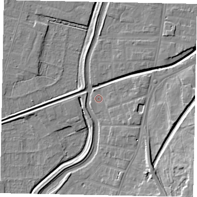 Shaded relief map of the ground around LN58DT, computed from Environment Agency LiDAR. The ground here sits at about 5 m above sea level and falls 16 m across the surrounding 800 m. Surface water reaching this point runs off ground lying to the south-east, 3.2 m higher.