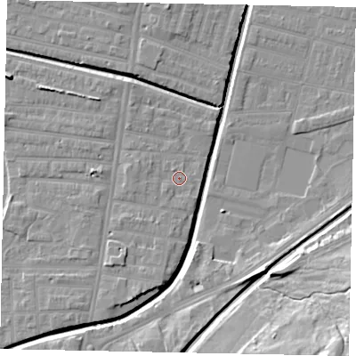 Shaded relief map of the ground around LN58LA, computed from Environment Agency LiDAR. The ground here sits at about 6 m above sea level and falls 19 m across the surrounding 800 m. Surface water reaching this point runs off ground lying to the west, 1.3 m higher.