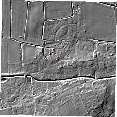Shaded relief map of the ground around LN65TS, computed from Environment Agency LiDAR. The ground here sits at about 7 m above sea level and falls 11 m across the surrounding 800 m. Surface water reaching this point runs off ground lying to the south-west, 2.4 m higher.