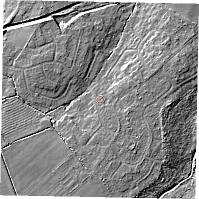 Shaded relief map of the ground around LN65XP, computed from Environment Agency LiDAR. The ground here sits at about 15 m above sea level and falls 9 m across the surrounding 800 m. Surface water reaching this point runs off ground lying to the south-east, 2.3 m higher.