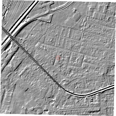 Shaded relief map of the ground around LN67UT, computed from Environment Agency LiDAR. The ground here sits at about 5 m above sea level and falls 6 m across the surrounding 800 m. Surface water reaching this point runs off ground lying to the south, 1.2 m higher.