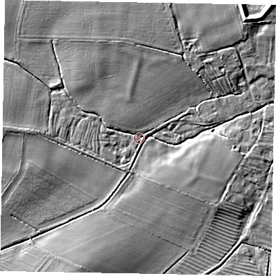 Shaded relief map of the ground around LN69LD, computed from Environment Agency LiDAR. The ground here sits at about 12 m above sea level and falls 9 m across the surrounding 800 m. Surface water reaching this point runs off ground lying to the west, 4.6 m higher.
