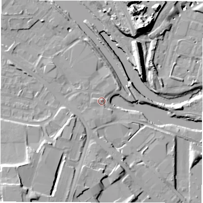 Shaded relief map of the ground around LS101DX, computed from Environment Agency LiDAR. The ground here sits at about 25 m above sea level and falls 22 m across the surrounding 800 m. Surface water reaching this point runs off ground lying to the north, 3.8 m higher.