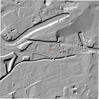Shaded relief map of the ground around LS115FH, computed from Environment Agency LiDAR. The ground here sits at about 29 m above sea level and falls 11 m across the surrounding 800 m. Surface water reaching this point runs off ground lying to the east-north-east, 0.9 m higher.