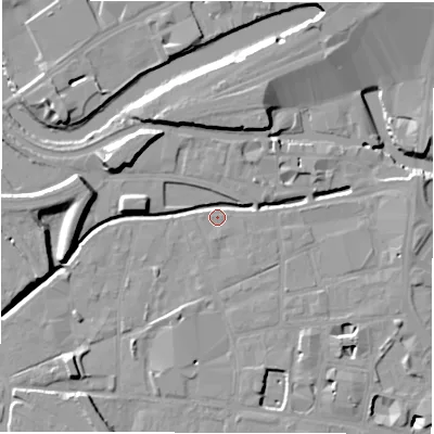 Shaded relief map of the ground around LS115WD, computed from Environment Agency LiDAR. The ground here sits at about 28 m above sea level and falls 11 m across the surrounding 800 m. Surface water reaching this point runs off ground lying to the south, 3.9 m higher.