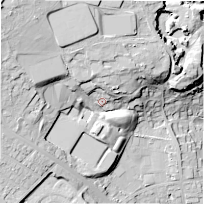 Shaded relief map of the ground around LS165TX, computed from Environment Agency LiDAR. The ground here sits at about 103 m above sea level and falls 48 m across the surrounding 800 m. Surface water reaching this point runs off ground lying to the north, 12.8 m higher.