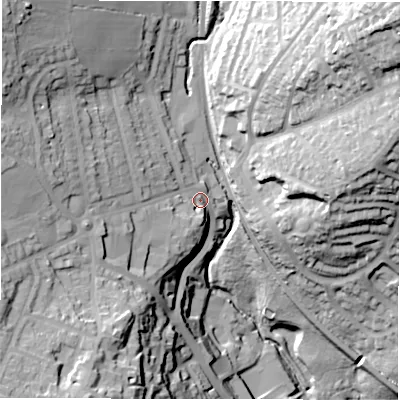 Shaded relief map of the ground around LS185NQ, computed from Environment Agency LiDAR. The ground here sits at about 112 m above sea level and falls 70 m across the surrounding 800 m. Surface water reaching this point runs off ground lying to the west-south-west, 24.0 m higher.