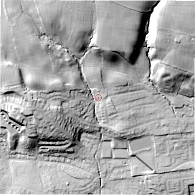 Shaded relief map of the ground around LS212AW, computed from Environment Agency LiDAR. The ground here sits at about 86 m above sea level and falls 61 m across the surrounding 800 m. Surface water reaching this point runs off ground lying to the north, 38.1 m higher.