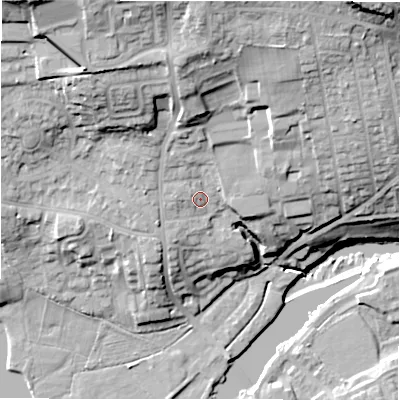 Shaded relief map of the ground around LS212AY, computed from Environment Agency LiDAR. The ground here sits at about 62 m above sea level and falls 33 m across the surrounding 800 m. Surface water reaching this point runs off ground lying to the north, 8.6 m higher.