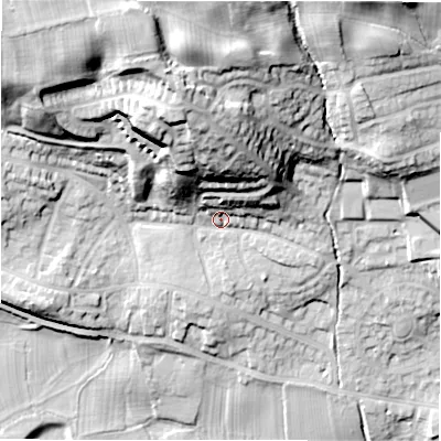 Shaded relief map of the ground around LS212EF, computed from Environment Agency LiDAR. The ground here sits at about 69 m above sea level and falls 45 m across the surrounding 800 m. Surface water reaching this point runs off ground lying to the north, 26.3 m higher.