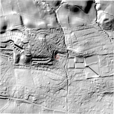 Shaded relief map of the ground around LS212RG, computed from Environment Agency LiDAR. The ground here sits at about 74 m above sea level and falls 56 m across the surrounding 800 m. Surface water reaching this point runs off ground lying to the north-north-west, 31.3 m higher.