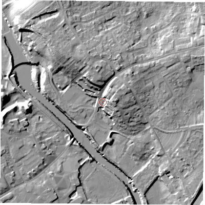 Shaded relief map of the ground around LS248AA, computed from Environment Agency LiDAR. The ground here sits at about 12 m above sea level and falls 18 m across the surrounding 800 m. Surface water reaching this point runs off ground lying to the north, 11.4 m higher.