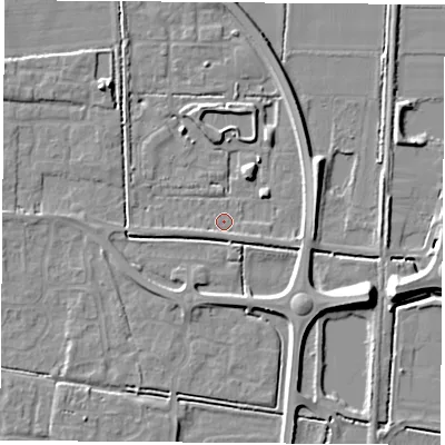 Shaded relief map of the ground around LS256DX, computed from Environment Agency LiDAR. The ground here sits at about 8 m above sea level and falls 9 m across the surrounding 800 m. Surface water reaching this point runs off ground lying to the east-north-east, 5.5 m higher.