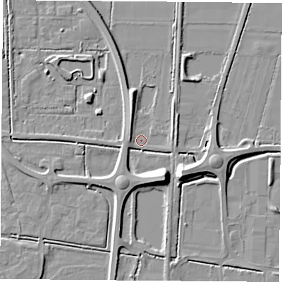 Shaded relief map of the ground around LS256DY, computed from Environment Agency LiDAR. The ground here sits at about 8 m above sea level and falls 9 m across the surrounding 800 m. Surface water reaching this point runs off ground lying to the south-east, 8.8 m higher.
