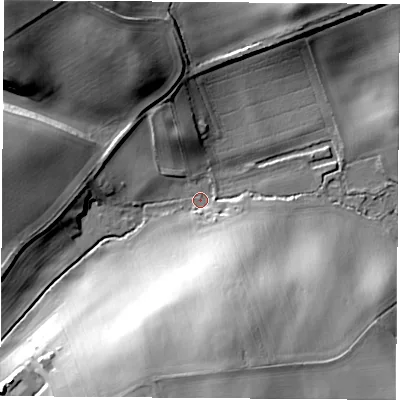 Shaded relief map of the ground around LS256JT, computed from Environment Agency LiDAR. The ground here sits at about 22 m above sea level and falls 27 m across the surrounding 800 m. Surface water reaching this point runs off ground lying to the south, 25.1 m higher.