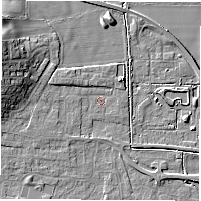 Shaded relief map of the ground around LS256LE, computed from Environment Agency LiDAR. The ground here sits at about 9 m above sea level and falls 14 m across the surrounding 800 m. Surface water reaching this point runs off ground lying to the west-north-west, 11.2 m higher.