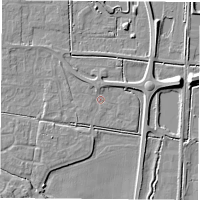 Shaded relief map of the ground around LS256PN, computed from Environment Agency LiDAR. The ground here sits at about 9 m above sea level and falls 9 m across the surrounding 800 m. Surface water reaching this point runs off ground lying to the north, 2.0 m higher.