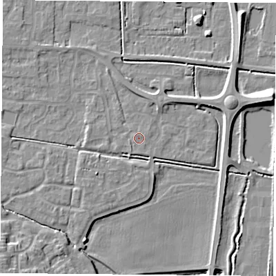 Shaded relief map of the ground around LS256PX, computed from Environment Agency LiDAR. The ground here sits at about 9 m above sea level and falls 12 m across the surrounding 800 m. Surface water reaching this point runs off ground lying to the north, 3.0 m higher.