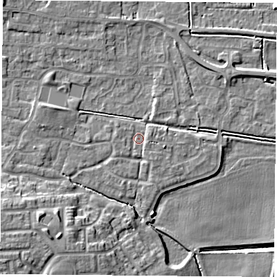 Shaded relief map of the ground around LS256QB, computed from Environment Agency LiDAR. The ground here sits at about 9 m above sea level and falls 13 m across the surrounding 800 m. Surface water reaching this point runs off ground lying to the west, 0.9 m higher.
