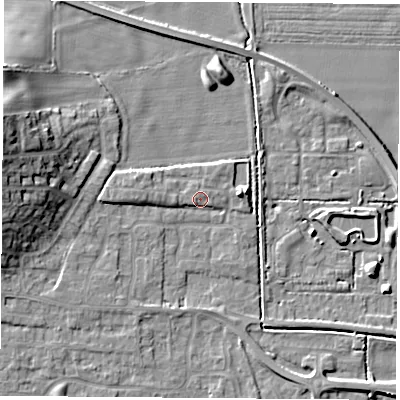 Shaded relief map of the ground around LS256QU, computed from Environment Agency LiDAR. The ground here sits at about 9 m above sea level and falls 14 m across the surrounding 800 m. Surface water reaching this point runs off ground lying to the west, 11.6 m higher.