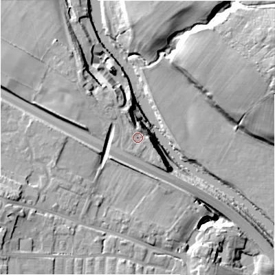 Shaded relief map of the ground around LS297DB, computed from Environment Agency LiDAR. The ground here sits at about 70 m above sea level and falls 26 m across the surrounding 800 m. The ground contributing surface water to this point lies to the west.