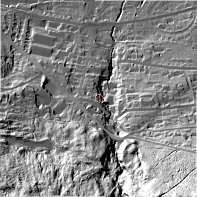 Shaded relief map of the ground around LS298RJ, computed from Environment Agency LiDAR. The ground here sits at about 132 m above sea level and falls 150 m across the surrounding 800 m. Surface water reaching this point runs off ground lying to the south-south-east, 114.0 m higher.
