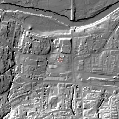 Shaded relief map of the ground around LS299DX, computed from Environment Agency LiDAR. The ground here sits at about 86 m above sea level and falls 55 m across the surrounding 800 m. Surface water reaching this point runs off ground lying to the south-south-east, 5.3 m higher.