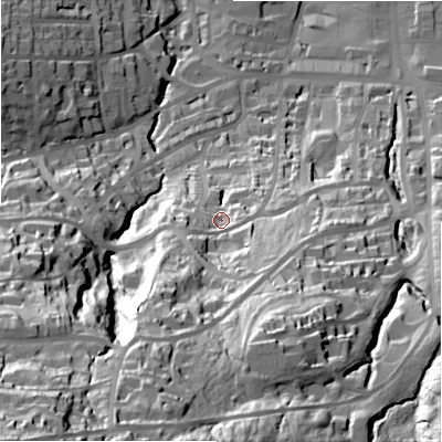 Shaded relief map of the ground around LS299ND, computed from Environment Agency LiDAR. The ground here sits at about 114 m above sea level and falls 108 m across the surrounding 800 m. Surface water reaching this point runs off ground lying to the south-south-west, 53.4 m higher.