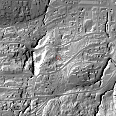Shaded relief map of the ground around LS299NP, computed from Environment Agency LiDAR. The ground here sits at about 132 m above sea level and falls 124 m across the surrounding 800 m. Surface water reaching this point runs off ground lying to the south-south-west, 42.5 m higher.